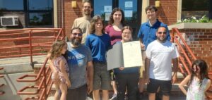 Worcester Emergency Communications Team posed with Governor's Amateur Radio Day proclamation